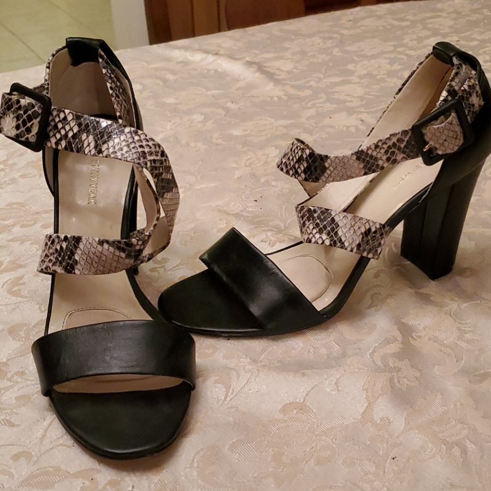 Scrappy sandal with snakeskin pattern.